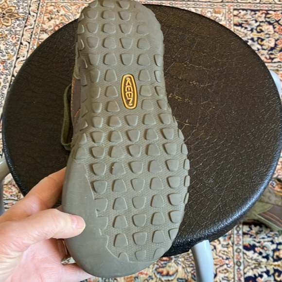 Keen hiking shoes in green and brown with orange stitching. - Picture 10 of 12